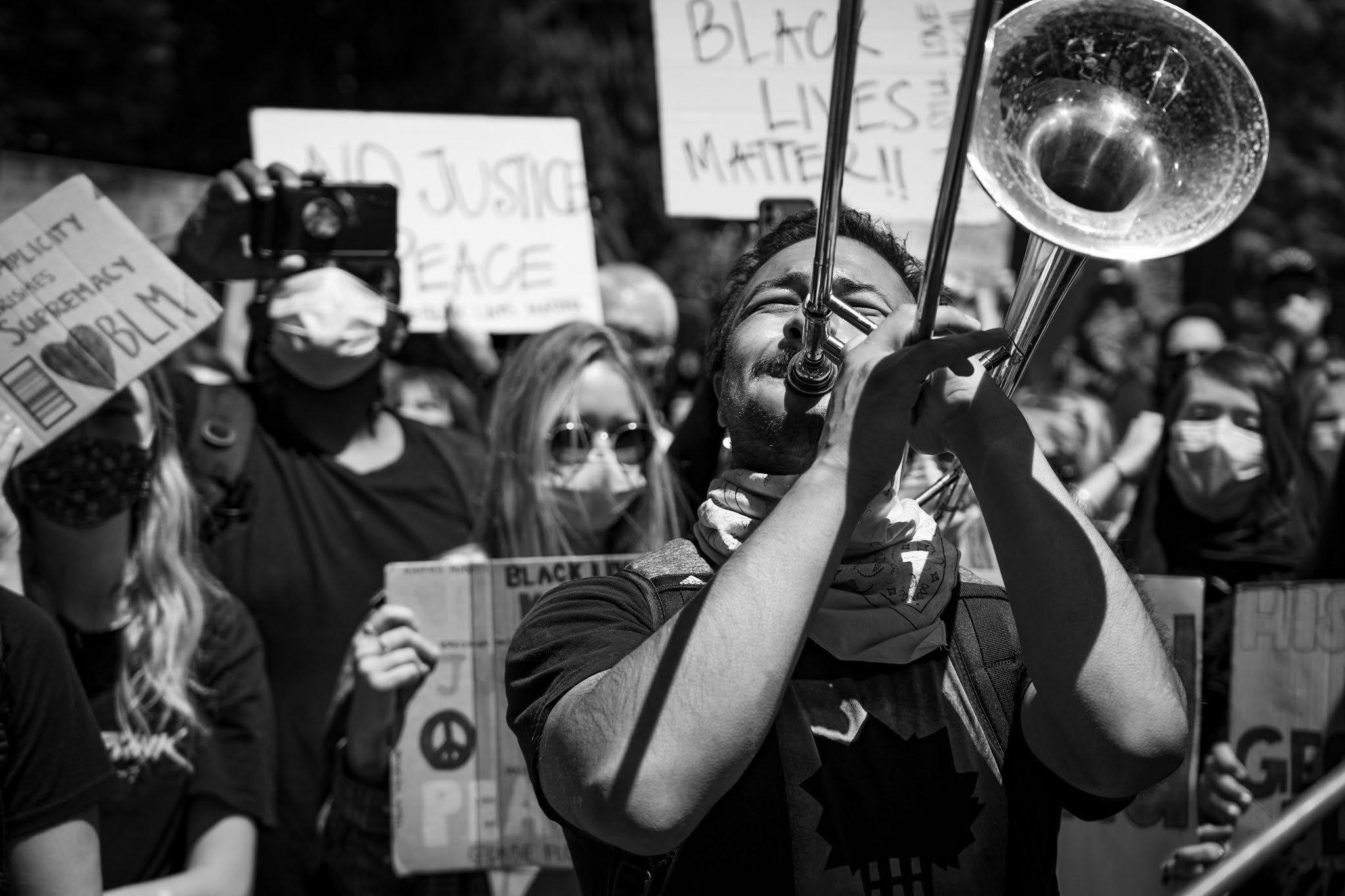 A brass player performs for demonstrators at a George Floyd protest in Sacramento, 2020. Photo: Jason Pierce / Sac Setlist